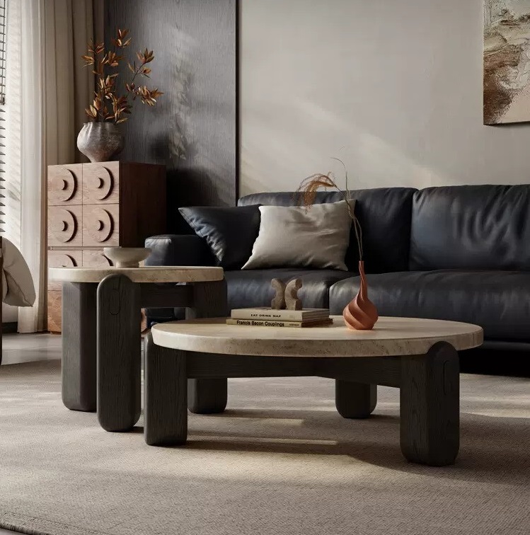 Modern Italian Travertine Stone and Wood Round Coffee Table featuring a beige marble top and sleek black wooden legs, showcasing a luxurious and elegant design suitable for contemporary interiors.