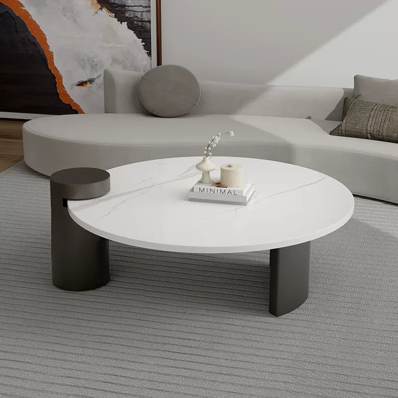 Stone top round Arlo coffee table with black carbon steel metal base, modern minimalist design, featuring black and white color contrast.