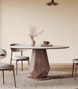 Luxury sintered stone circle dining table with solid ash wood pedestal base and walnut finish, featuring a modern sculptural design for contemporary dining spaces.
