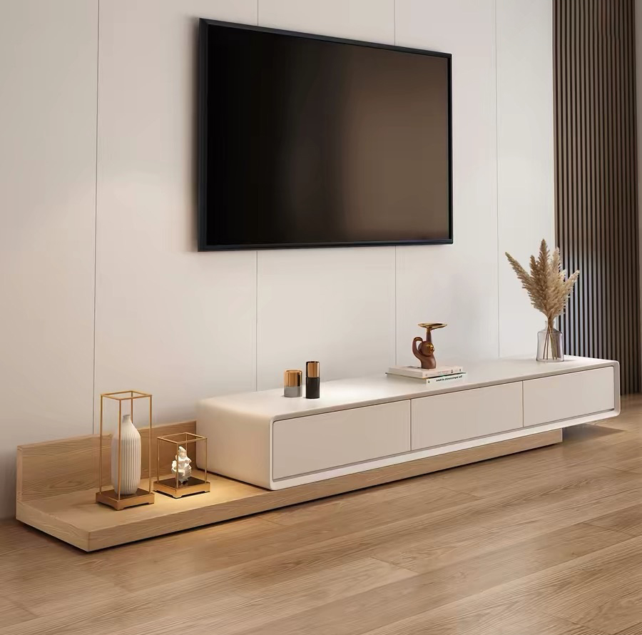Low profile extendable modern TV unit featuring a sleek minimalist matte white 3-drawer floating cabinet sliding over a natural light oak wood base under a wall-mounted flat-screen television.