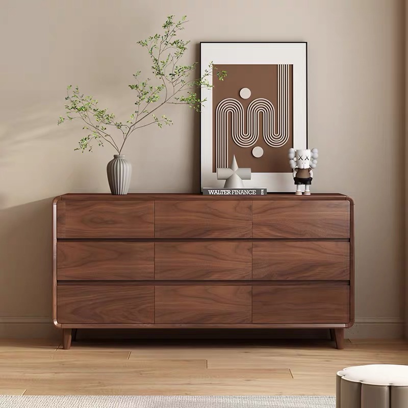 Luxury solid rubber wood chest of drawers in walnut finish with multiple spacious drawers, rounded corners, hidden handles, and solid wood legs, ideal for bedroom and living room storage.