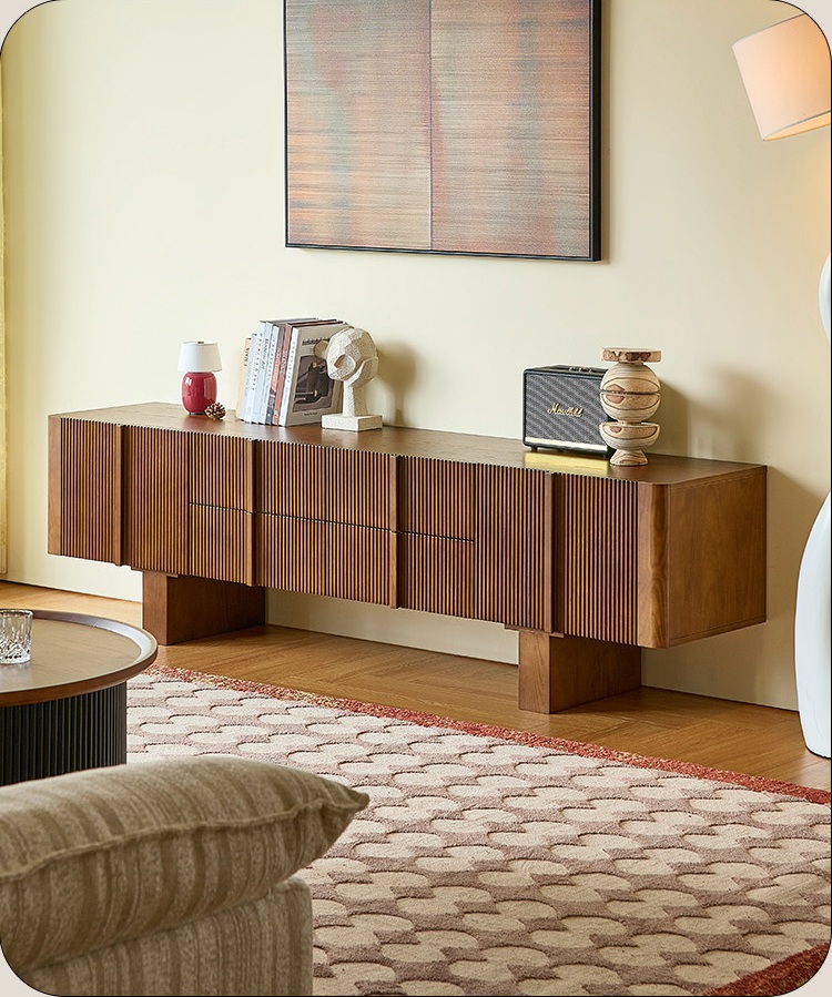 Front view of a contemporary dark brown solid ash wood TV entertainment unit with architectural fluted paneling and rectangular support legs. Tv Unit with 4 drawers & 2 cabinets.