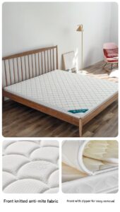 S-shaped natural jute firm mattress on a modern wooden bed frame in a sunlit bedroom setting. Jute Core Layer (2.jpg):